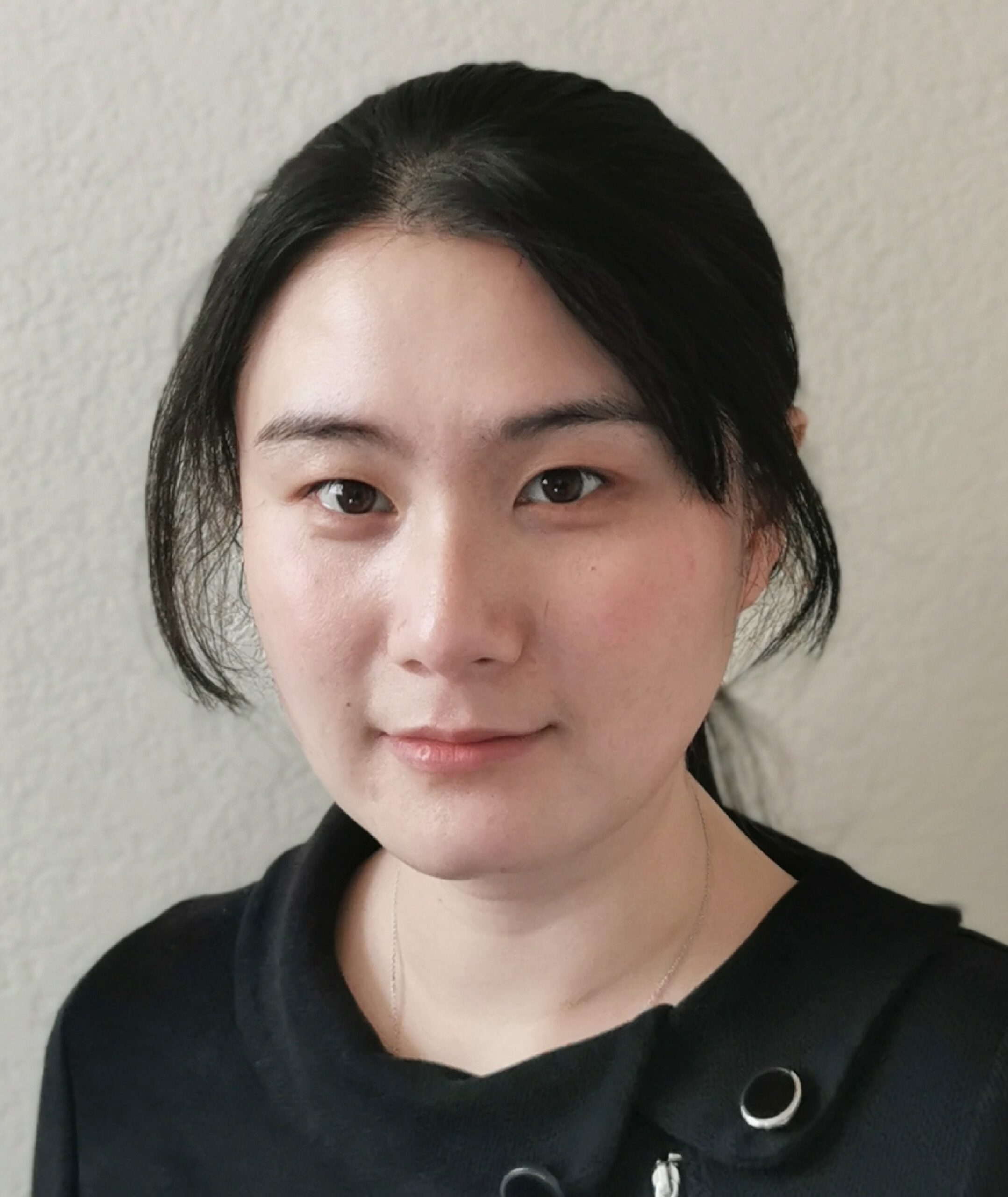 headshot of Jin Zhang