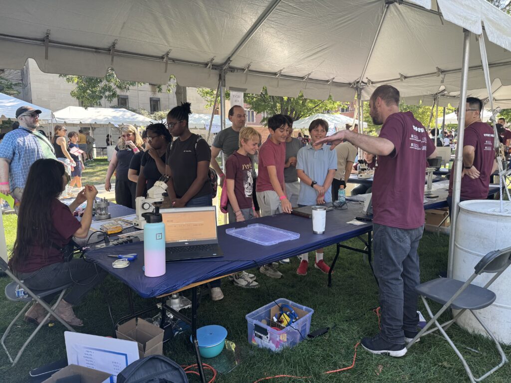 SEES staff talk to interested onlookers at the South Side Science Festival.