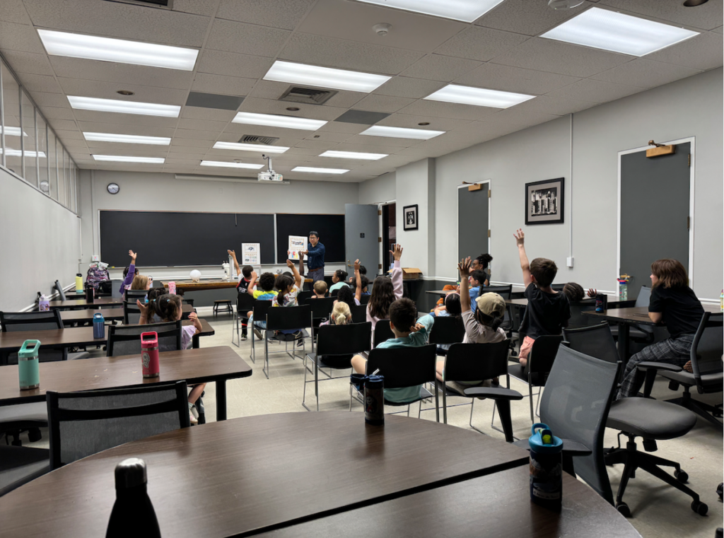 As part of the University of Chicago Laboratory Schools “Adventure Day” program, kindergarten students participated in a hands-on outreach activity led by SEES beamline scientist Dongzhou Zhang. Using microscopes, synthetic gems, posters, and a model diamond anvil cell, students learned how scientists investigate materials under the extreme pressures found deep inside the Earth.